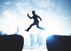 side-view-of-businessman-silhouette-jumping-from-c-2026-01-11-08-46-06-utc (1)